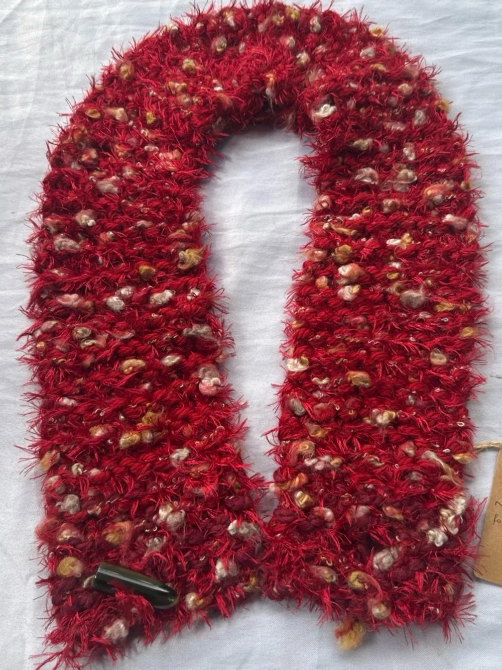 Cozy Red Textured Loop Scarf with Multicolor Pom Accents
